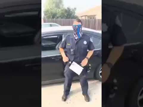 Black Mother Stands Up to Cop and Refuses to Let Her Son Become a Hashtag